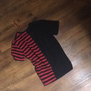 Half plain black and the other red with black strips.